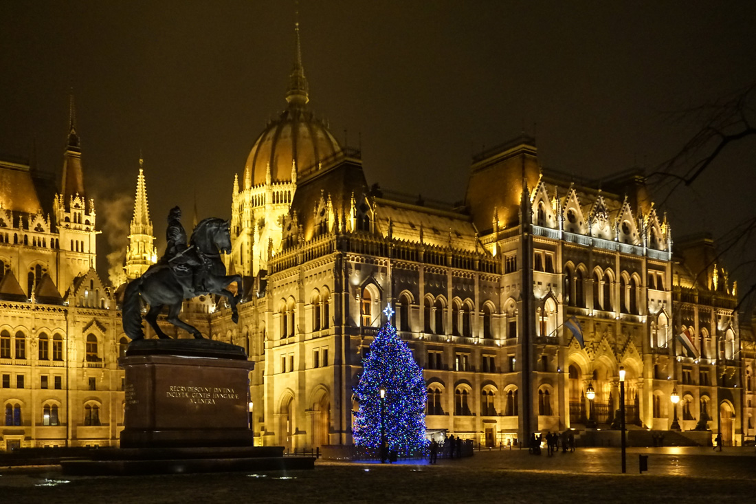 Blue Christmas Tree in front of Hungarian Parliament Building